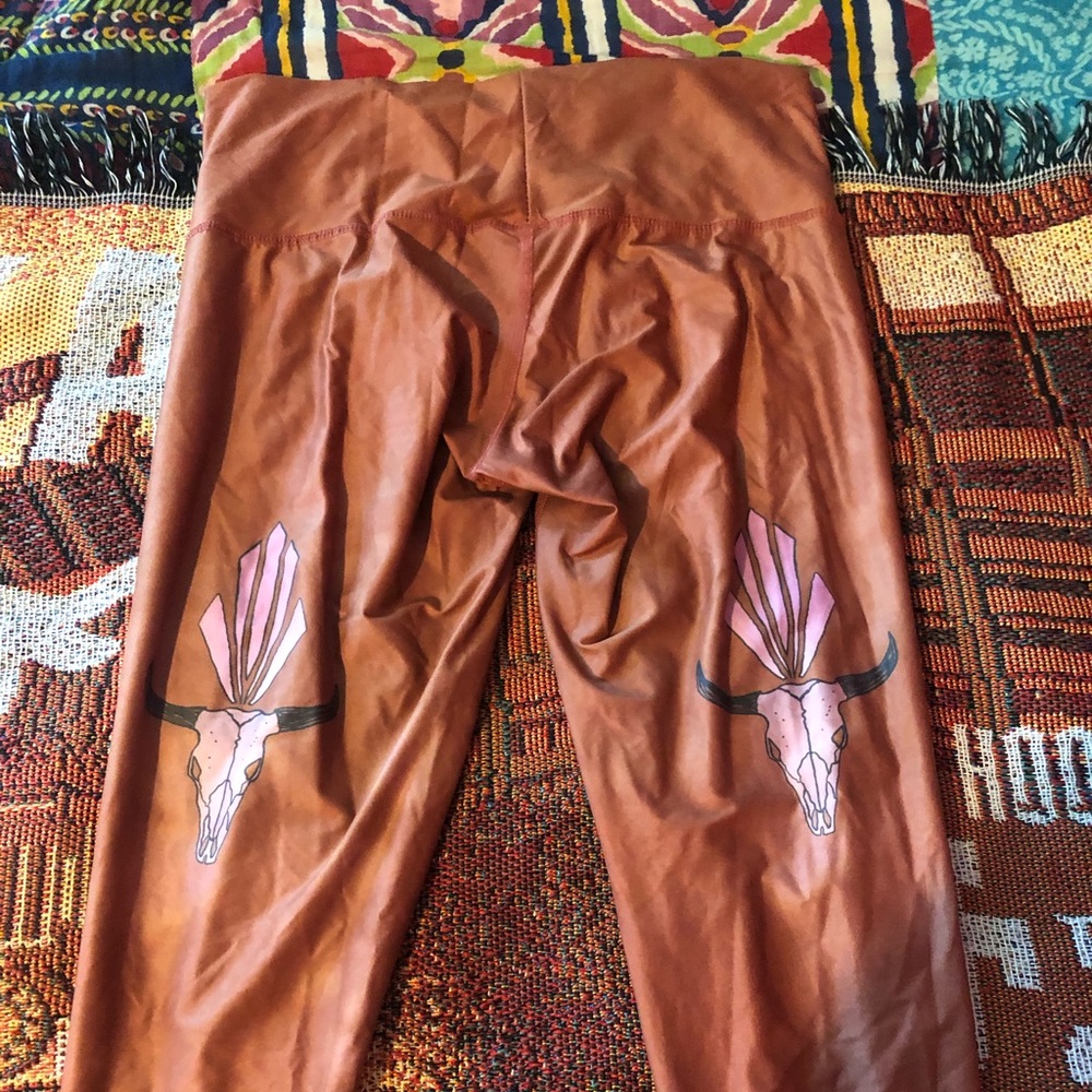 teeki orange cow skull legging